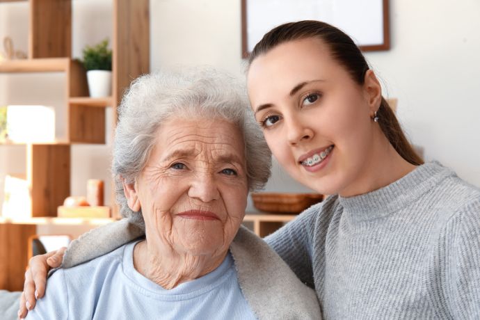 Senior woman with her granddaughter at home